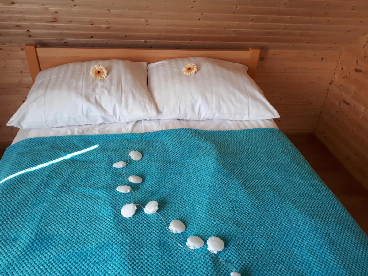 Domki Letniskowe Turkus Rewal Bagian luar foto