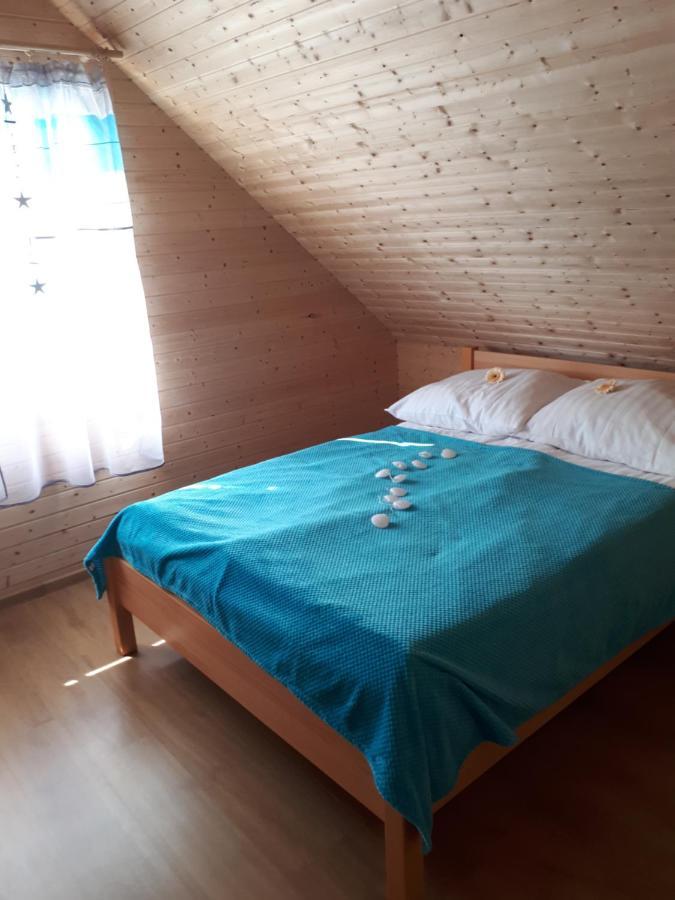 Domki Letniskowe Turkus Rewal Bagian luar foto